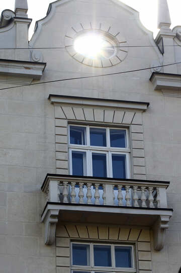 Balcony with window and on top theres a hole where lights can shine through №51904