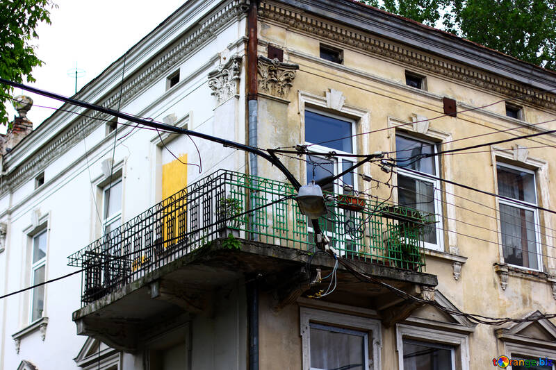 Building with balcony, with wires №51783