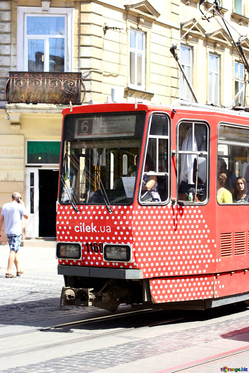 red electric street car in city tram train №51726