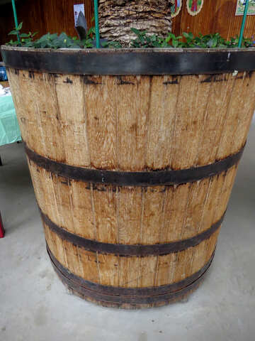 An old barrel flowerpot №52391
