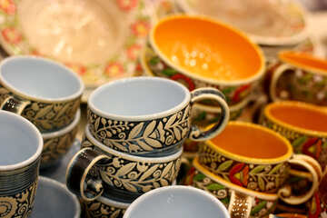 round decorative mugs of brown, gold, and orange colors №52756