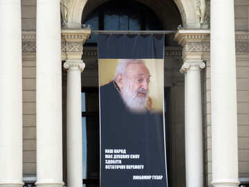 banner of a man in front of a building №52267