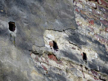 Viejo muro de hormigón con agujeros №52238