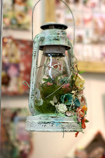 A broken lantern with wild flowers №52995