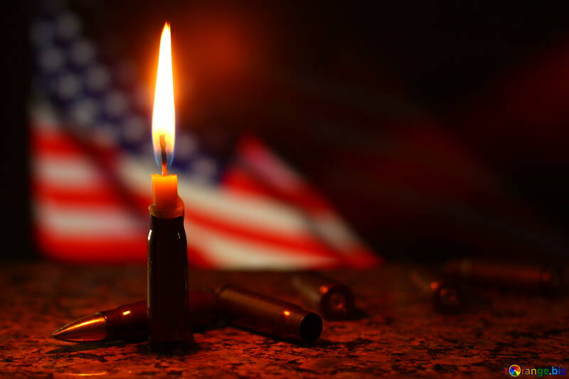 Una candela con bandiera americana in background №52512