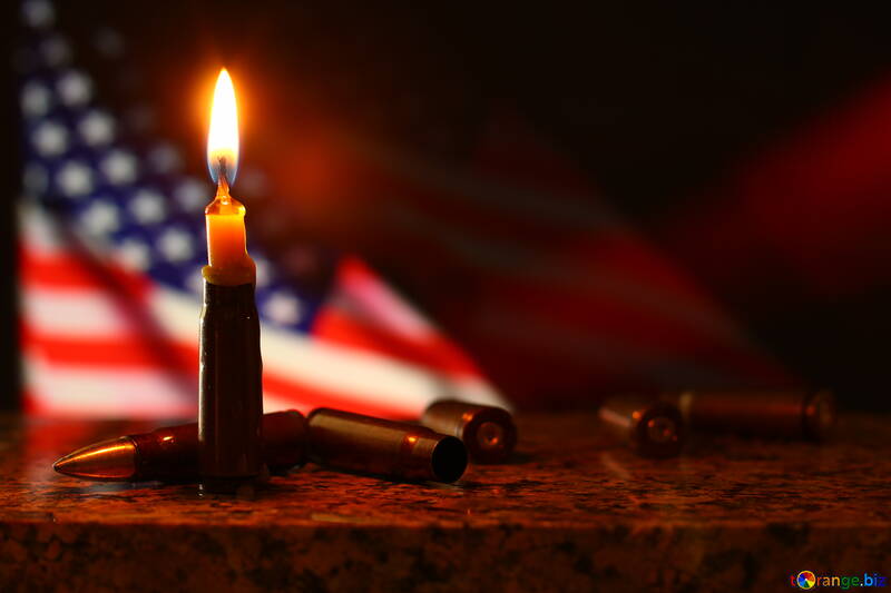 burning candle infront of an american flag №52506