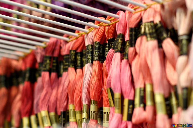 A rack of threads being displayed for sale. №52548