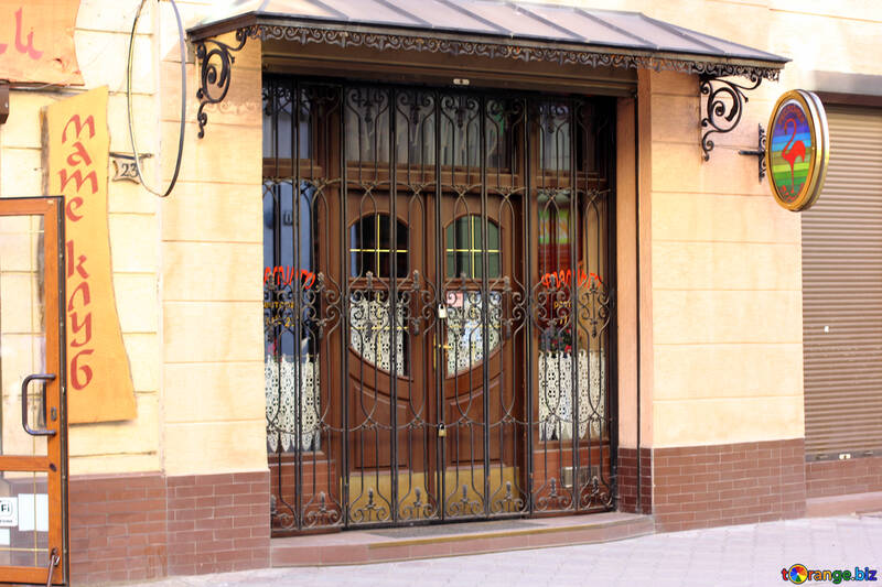 Brown door with grill in front №52016