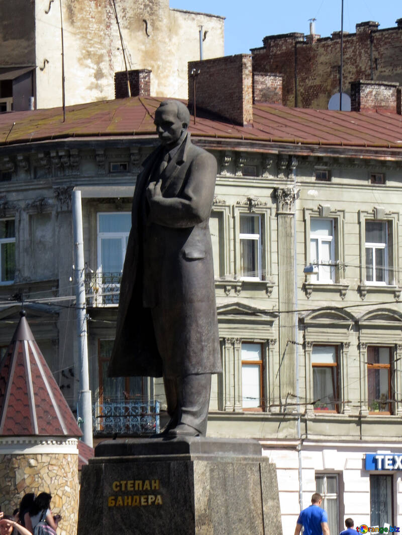 Stepan Bandera statue of a man in a town front of building middle city sclpture №52209