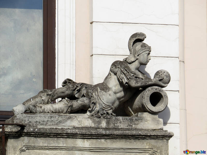 Statue on a ledge with helmet №52318