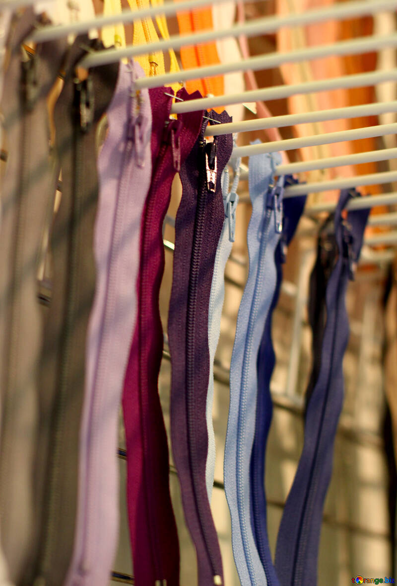 Zippers hanging on a rack №52539
