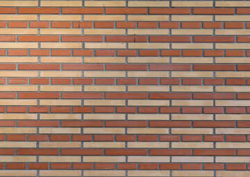Brickwork close up of a brick building orange yellow brown pattern texture №53402