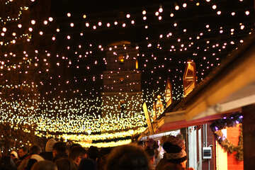 Lights hanging over a city street night №53520