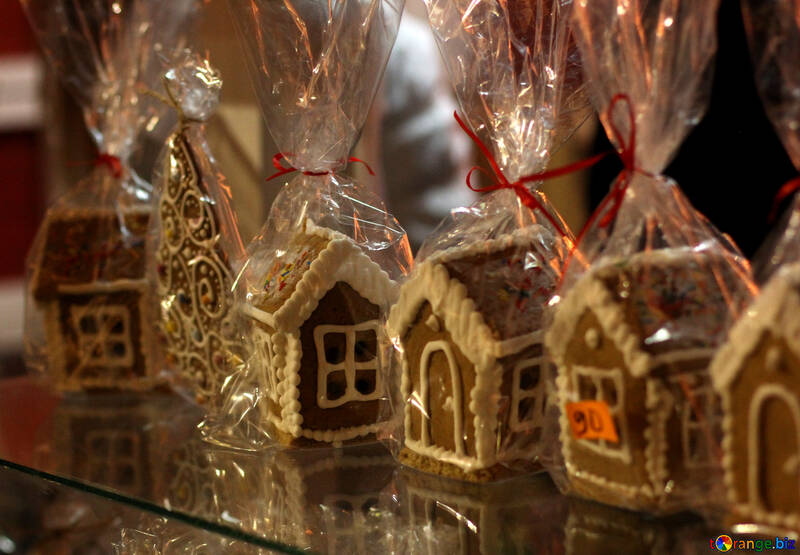 Bonbons de Noël de maisons de pain d`épice emballés avec du pain d`épice de cellophane de maison de cadeau №53480