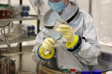 a person helping making the cure for corona virus scientist at work №54608