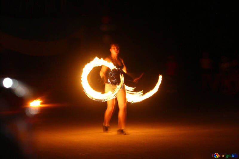 Fire dancer girl making fire figures №54393
