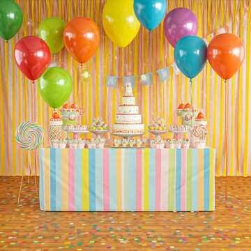 Colorful Birthday Party Table Decor with Cake, Cupcakes, and Balloons №56836