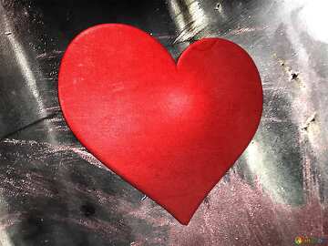 Vibrant Red Heart on Metallic Background - Symbol of Love and Emotion