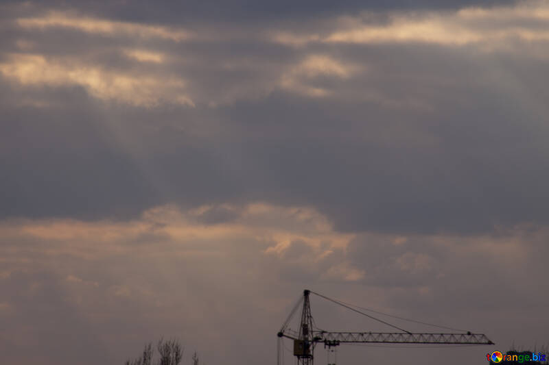 Lifting  Crane  at  under construction  rays  Sun №7506