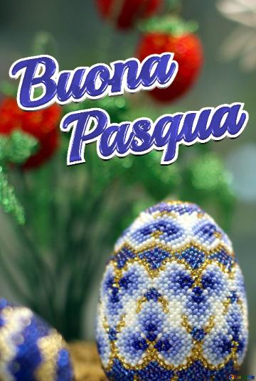 Buona Pasqua Easter egg decorated with beads on the background of flowers