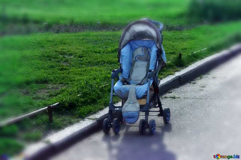 Empty stroller on sidewalk in park №5127