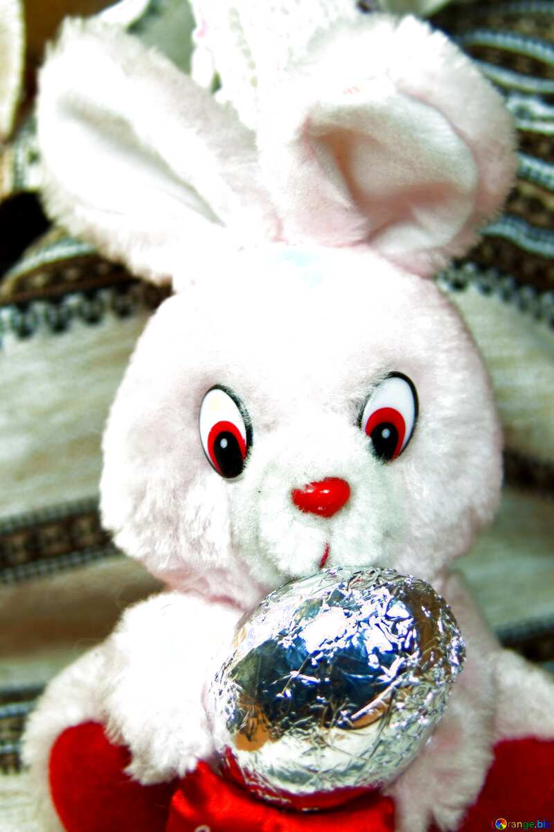 White Easter rabbit with egg №4321