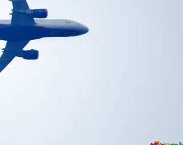 FX №19256 Blue color. Passenger plane in the sky.