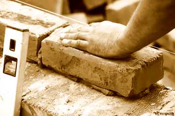 FX №19041 Mason building brick wall hand on brick