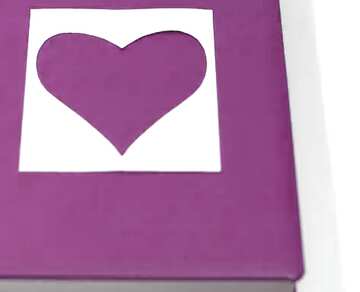 FX №2912 cut out hart out of white paper on book