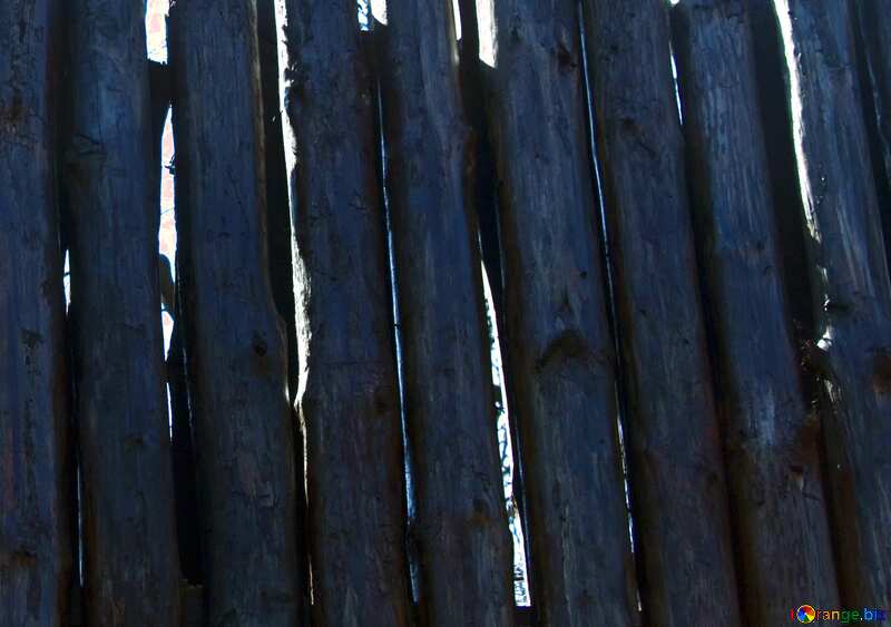 Blue color. A fence made of logs. Stockade.. №4572