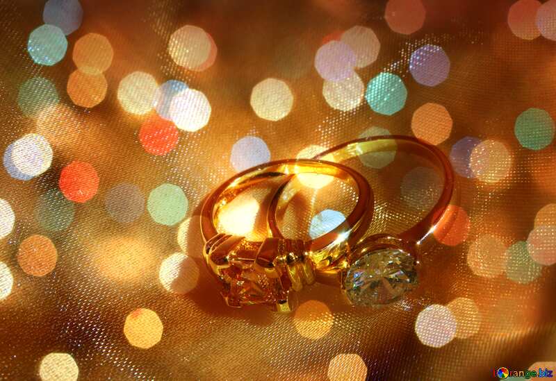 Golden wedding rings and wedding couple - Invitation Stock Photo - Alamy