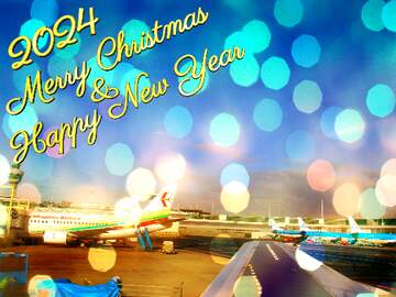 FX №206999 View from the airplane on the aircraft at the terminal at the airport Christmas background happy...