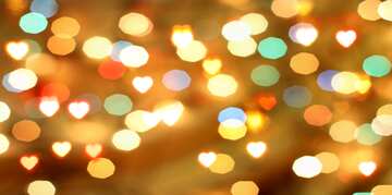 A bokeh lights background with big hearts