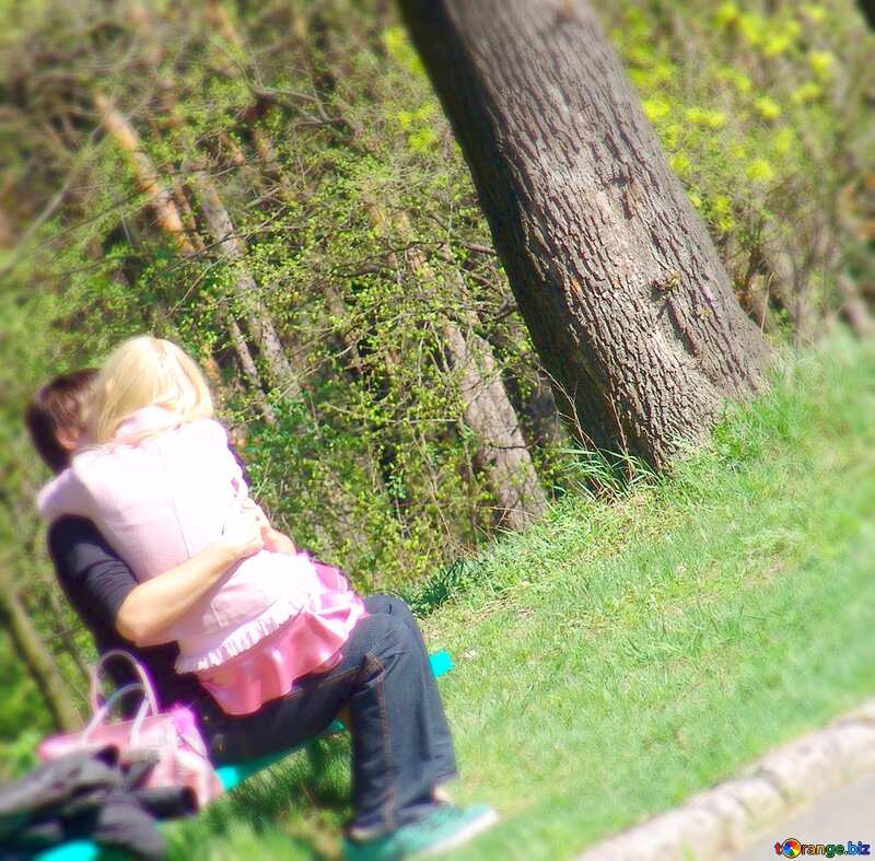 Image for profile picture Loving couple kissing on bench in the park in spring. №550