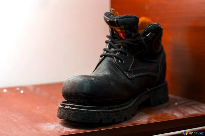 An old boot in the nightstand dark stained red №15461