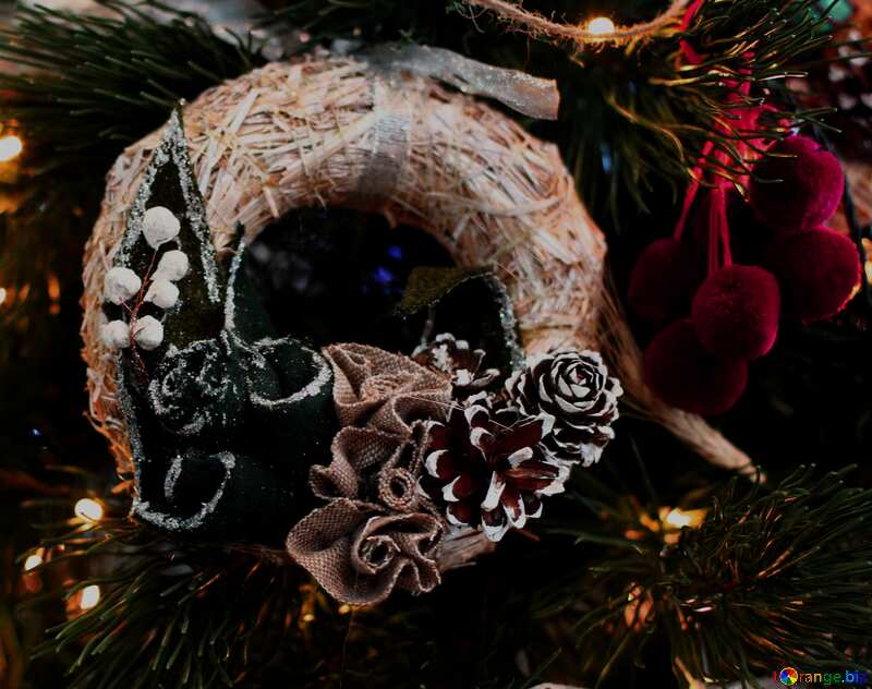 Christmas wreath decoration on a Christmas tree dark red monochrome №47828