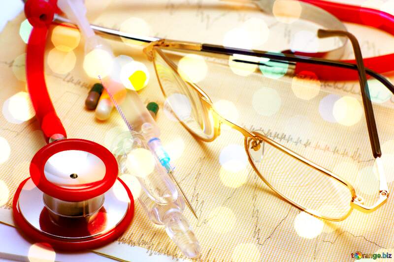 Medical Tools and Equipment with Bokeh Effect - Stethoscope, Glasses, and Syringe №19850