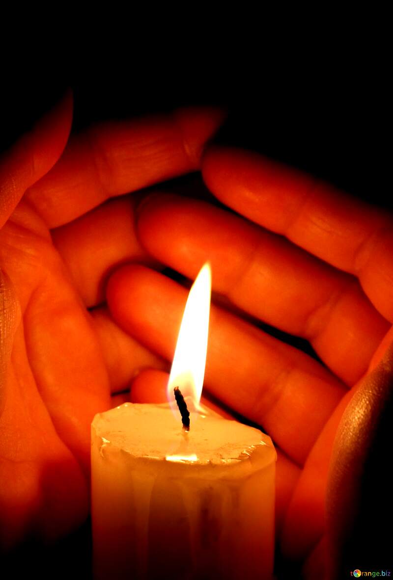 Warm Glow of a Candle Embraced by Hands №18119
