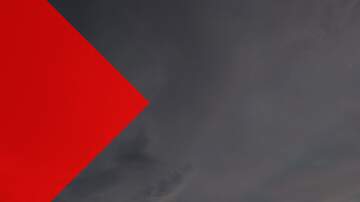 FX №276913 Dynamic Composition of Red Shapes Against a Stormy Sky