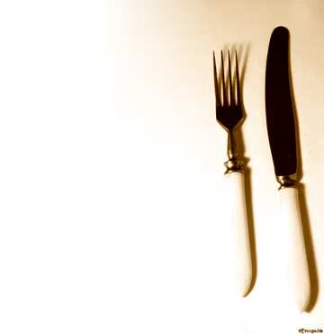 FX №3903 Template background for the label. The knife and fork. Old with white bone handle..