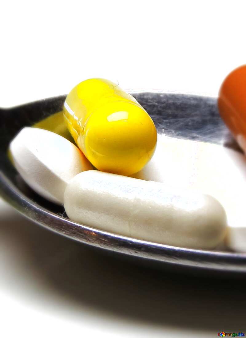 Pills in a spoon blur frame №20200