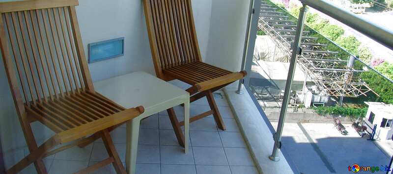 Обложка. Складные стулья на балконе. №7896