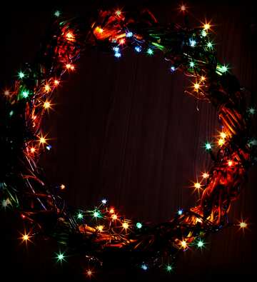 FX №77664 Dark background Christmas lights wreath copy space