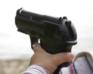 FX №77896 Gun in child hands